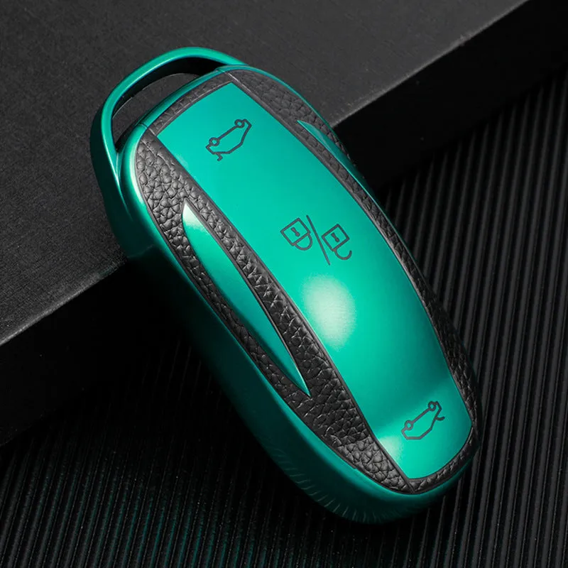 TPU key case with leather pattern finish and carabiner clip in four colour options: red, blue, silver, green