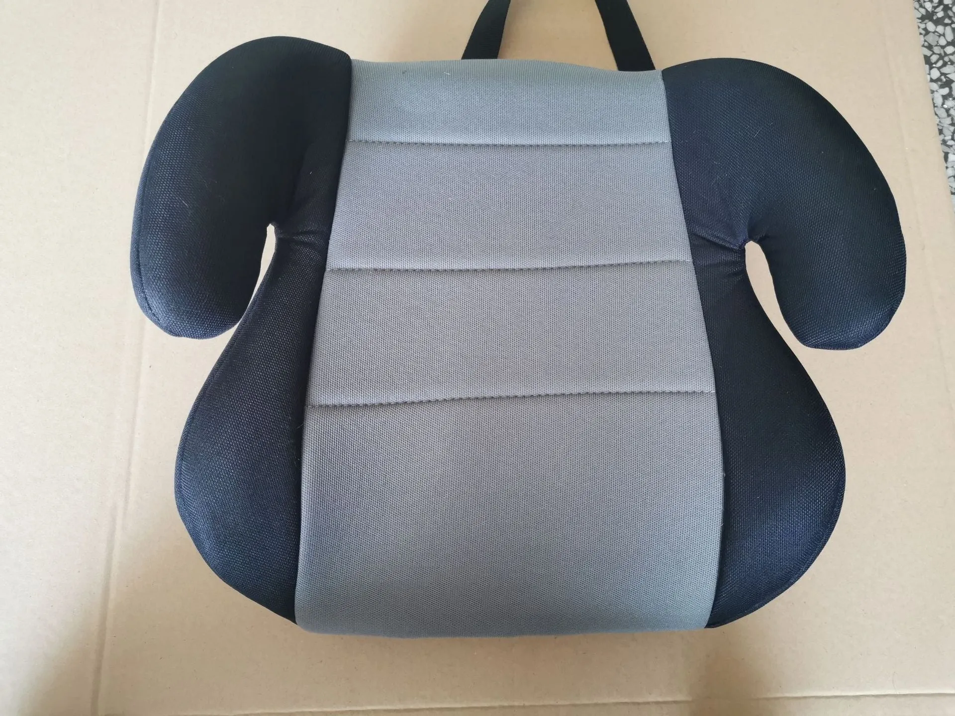 Portable children's car seat booster in blue with knitted cotton seat and plastic frame