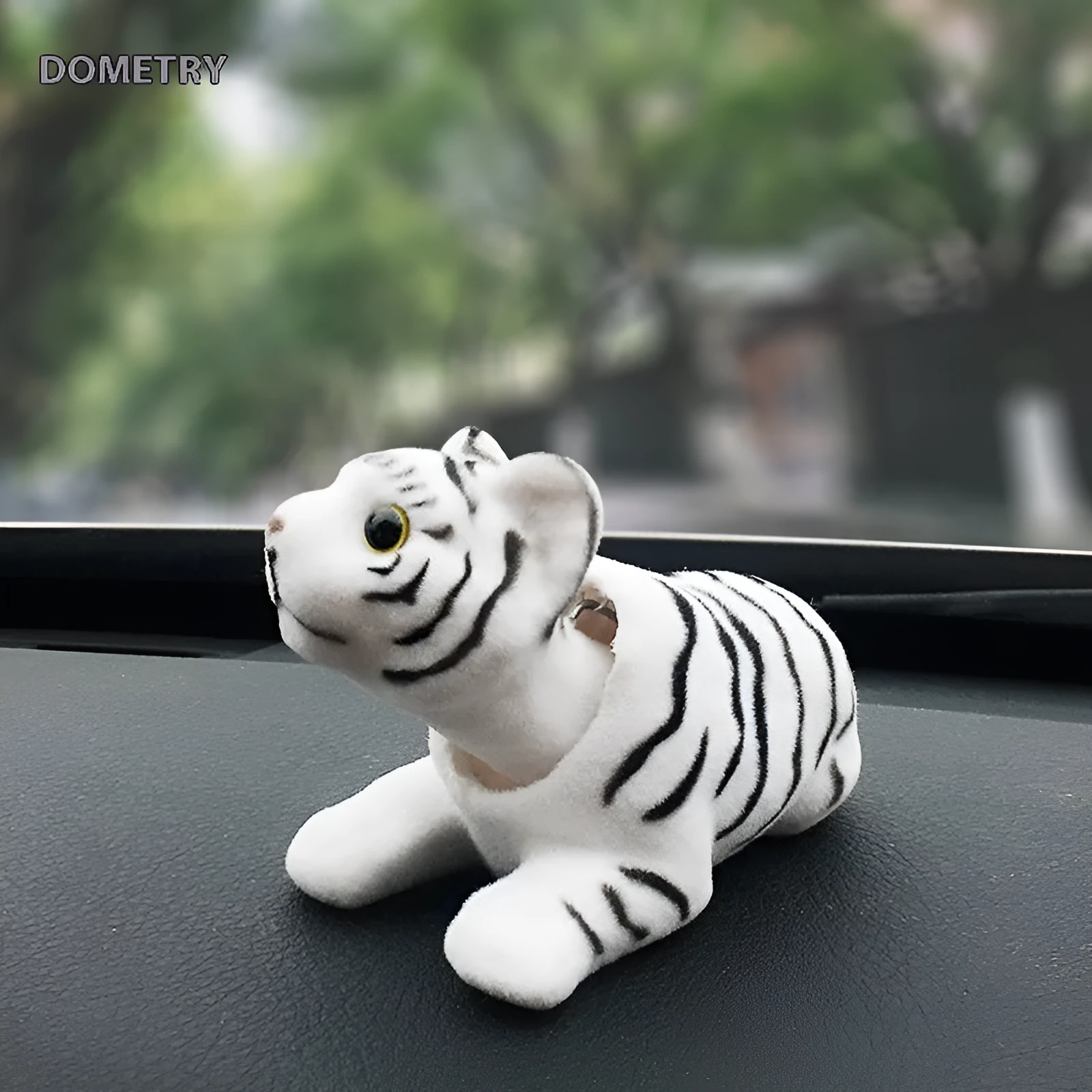 Resin head-shaking dog car decoration in Labrador colour, modern style, on a car dashboard
