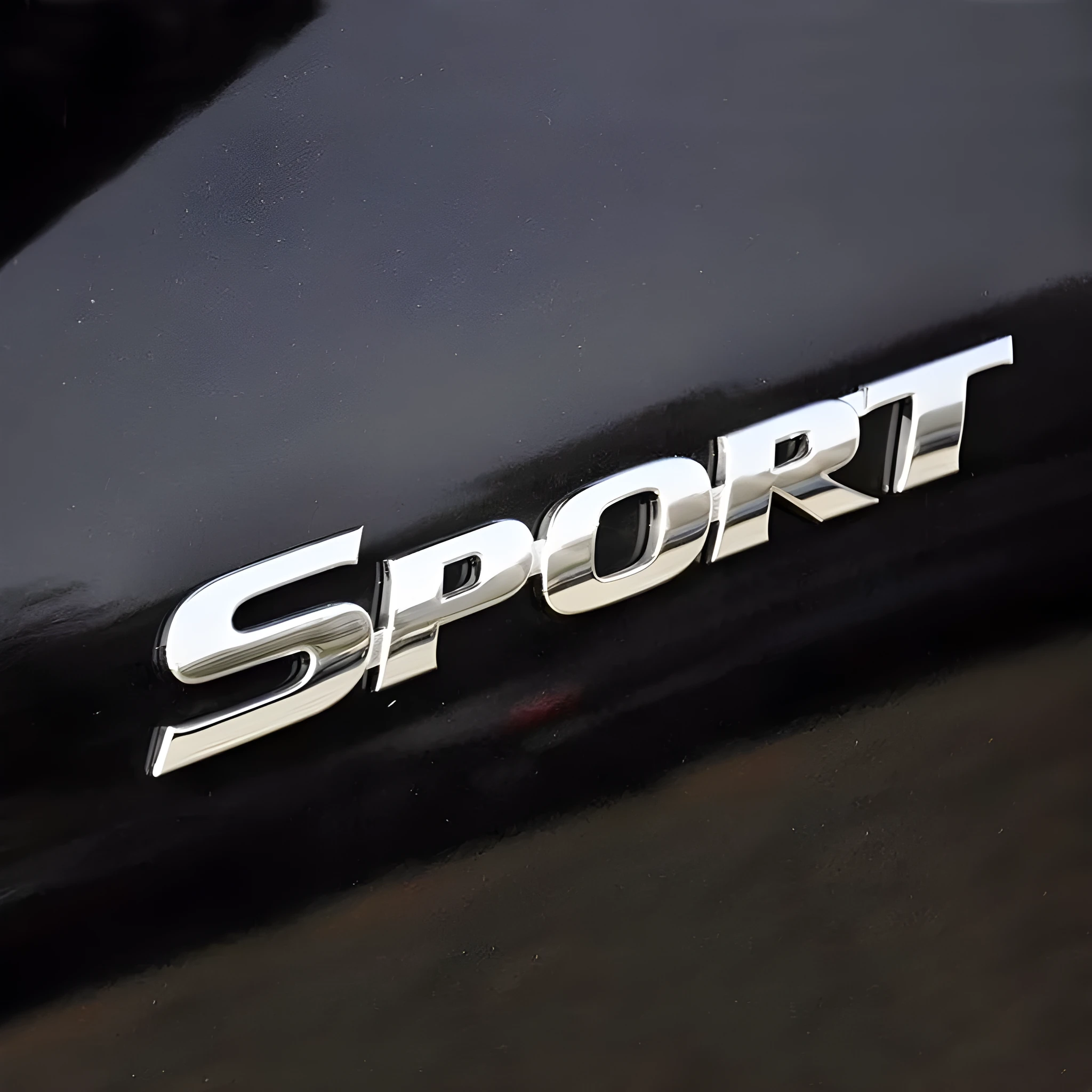 Sport tail sticker in silver electroplated finish, ABS material, 11.3cm length