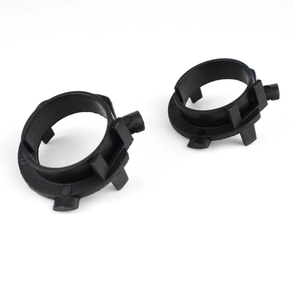 Black ABS plastic headlight adjustment card holder for compatible car models.