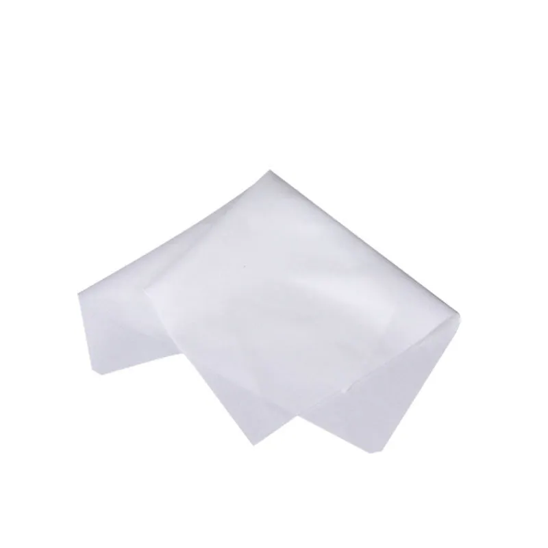 Car scratch repair kit with polishing wax, sandpaper, sponge, cloth, scraper, and brush on workbench