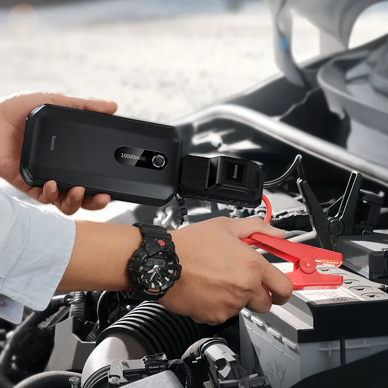 Black vehicle mounted emergency lighter jump starter with 10000mAh capacity and USB output