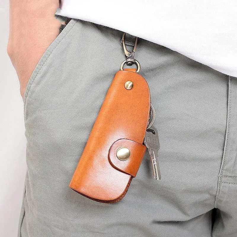 Genuine leather car key case in four colour options showing multifunctional storage design