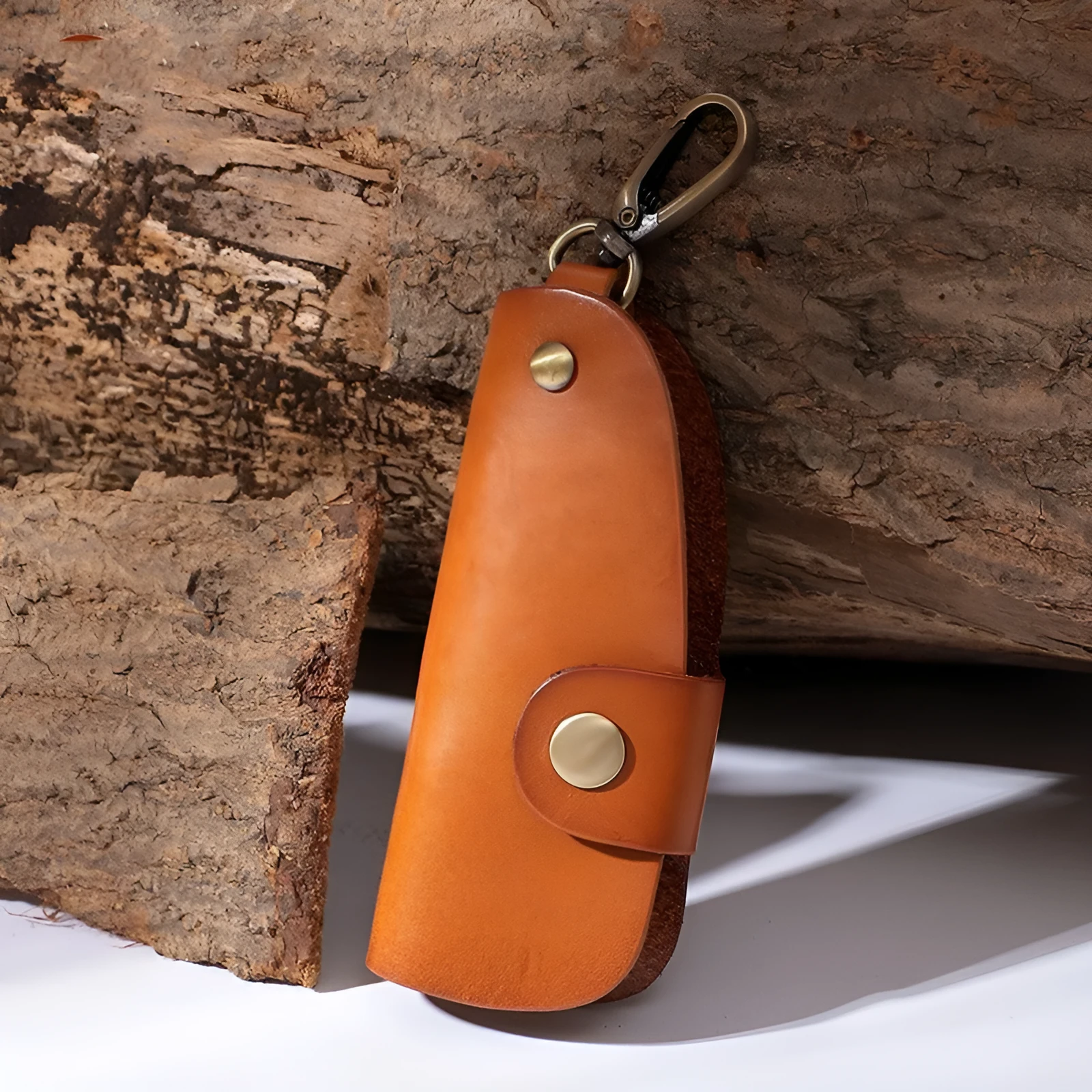 Genuine leather car key case in four colour options showing multifunctional storage design