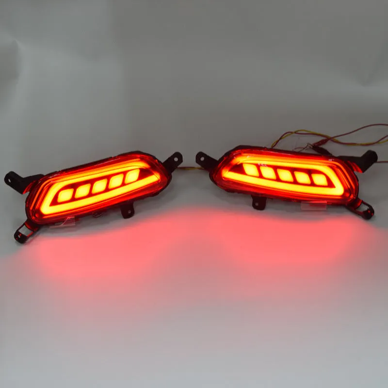 Pair of black LED brake light bulbs for Mazda car application displayed on white background