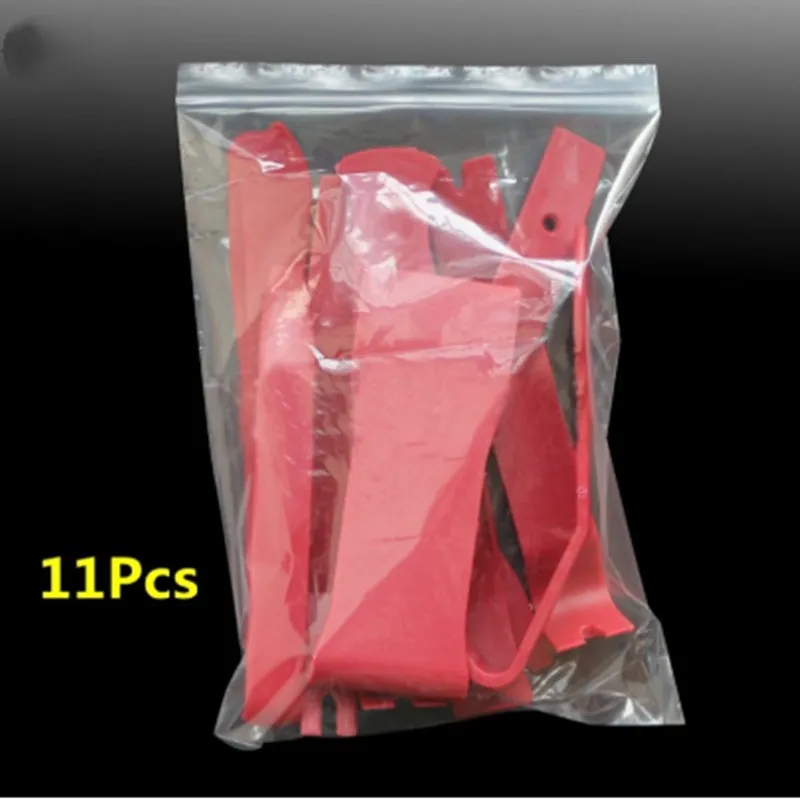 11 red plastic car disassembly tools including panel removers and clip removers for stereo refit kit