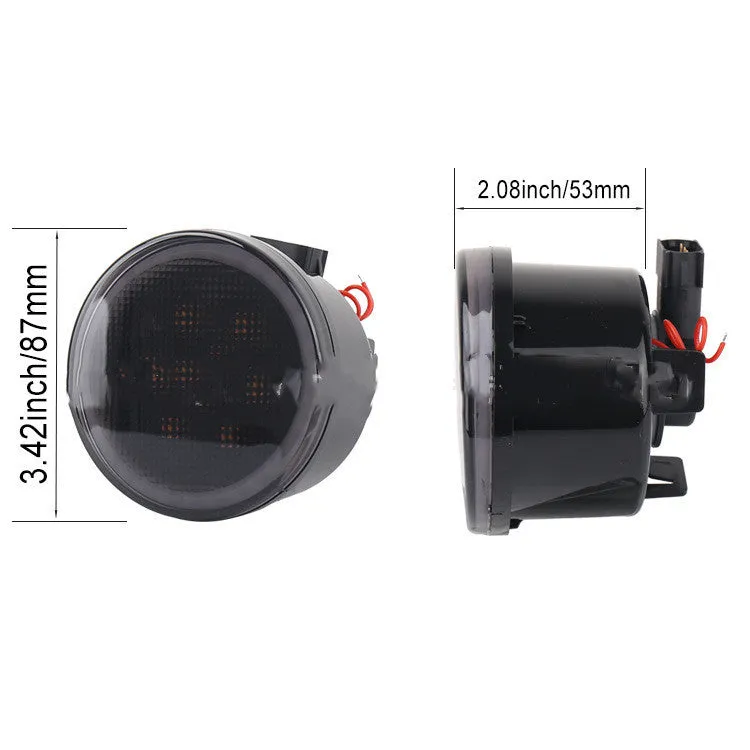 Pair of yellow LED turn signal lights mounted in Jeep Wrangler JK centre grille with ABS polymer housing