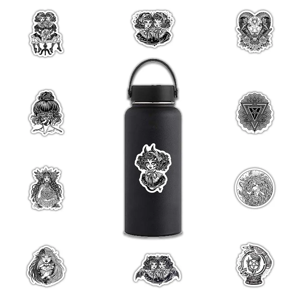 50 black and white gothic graffiti stickers on a table, showing assorted designs on a phone case and laptop