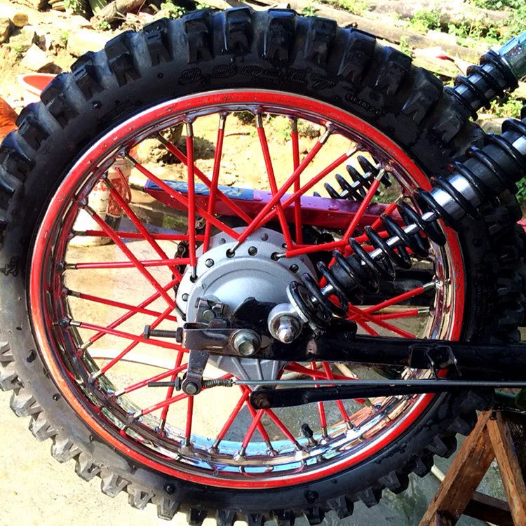 72 plastic motorcycle spoke wraps in assorted colours, 24cm length, on a wheel