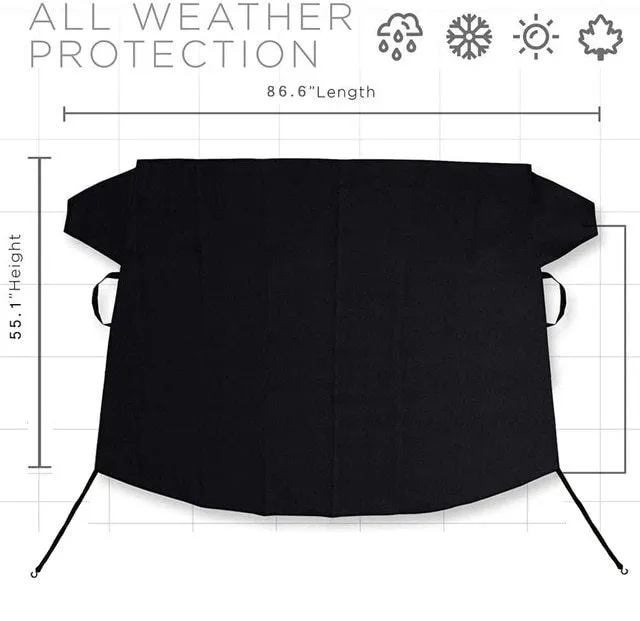 Black rubber Oxford cloth windshield ice and snow gown draped over car windscreen in winter
