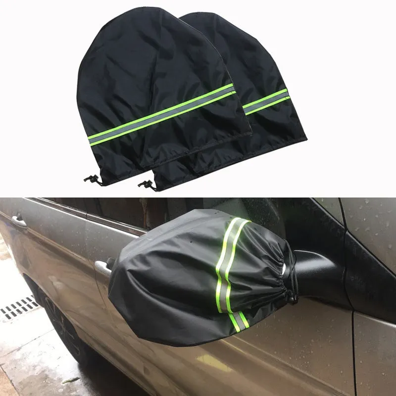 Black rubber Oxford cloth windshield ice and snow gown draped over car windscreen in winter