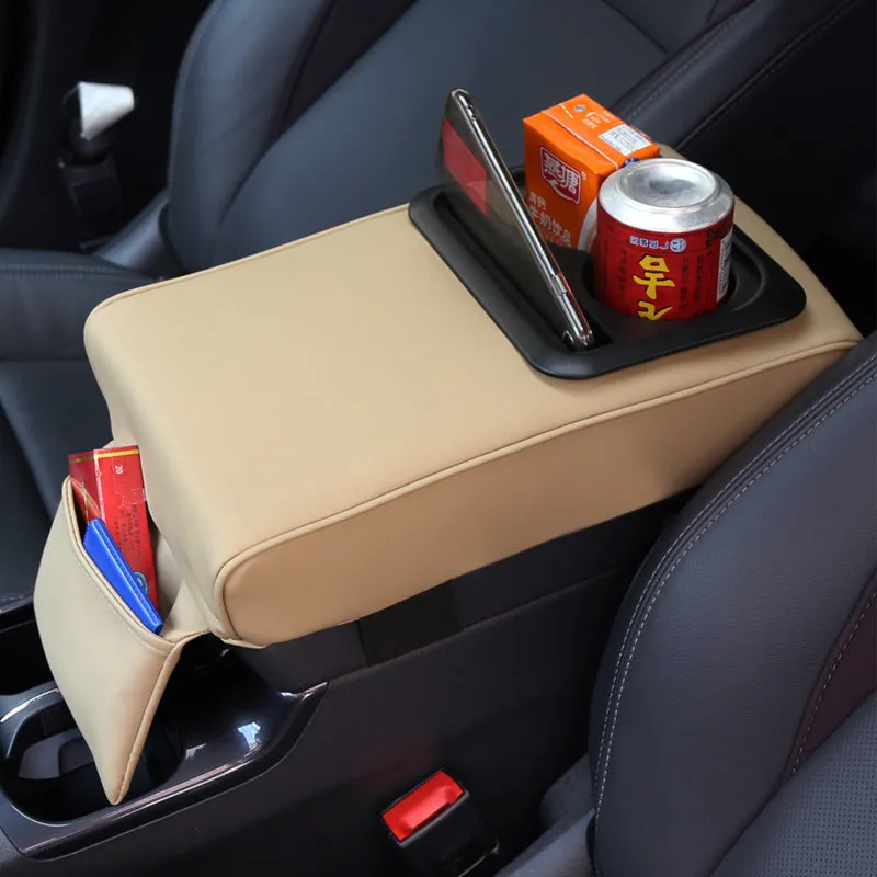 Beige leather car armrest box with water cup holder on a car centre console