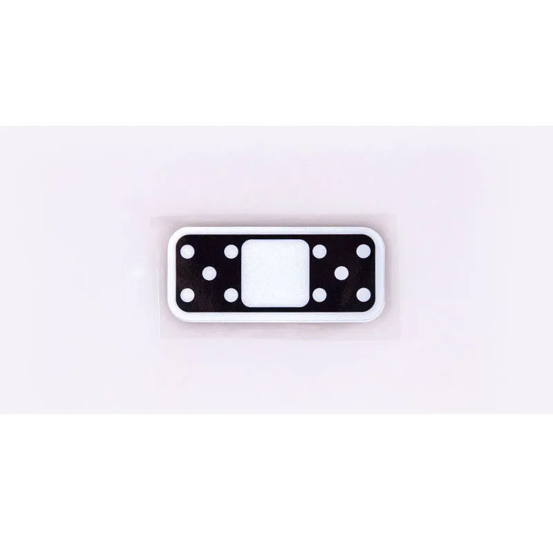 White cross reflective PVC car body sticker on a vehicle exterior panel