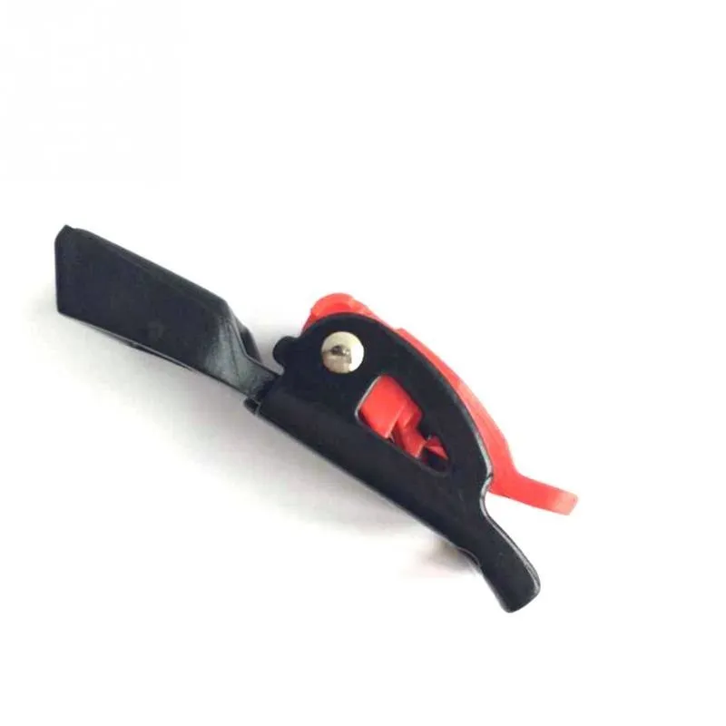 Three black and red plastic helmet chin strap quick-release buckles with buckle mechanism visible