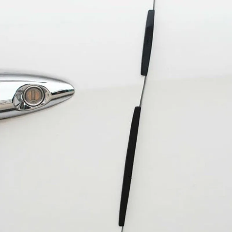 8-piece car door edge guard set in black and transparent trim on a vehicle door