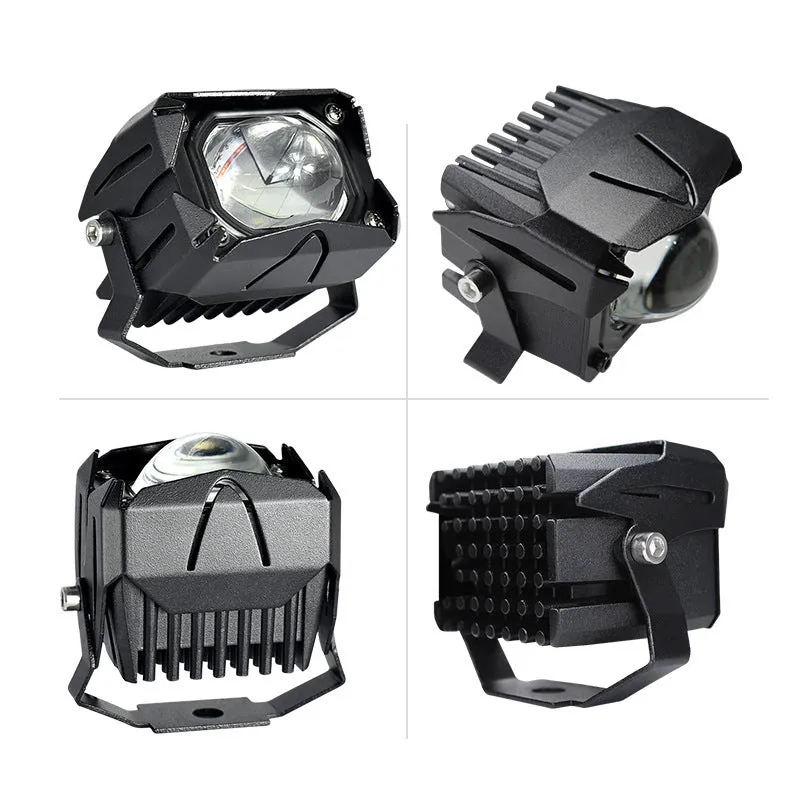Black aluminium motorcycle spotlight with LED projection lens and dual-colour light output