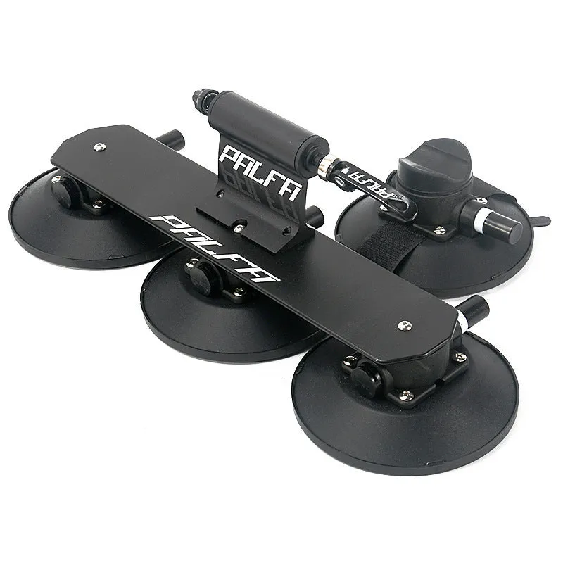 Bicycle vacuum adsorption roof rack made of aluminium alloy and rubber in red colour on a car roof