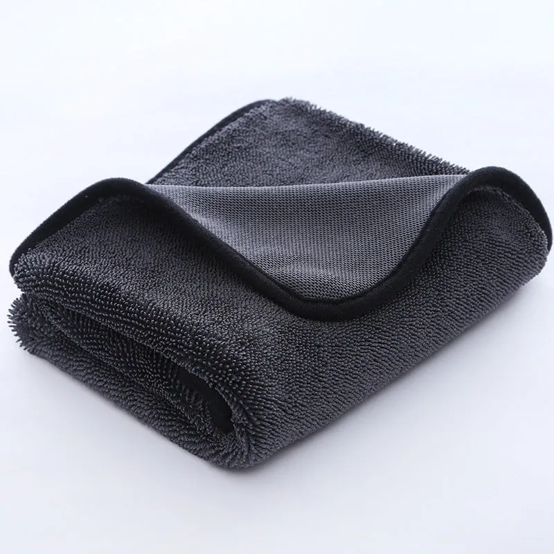 Grey car cleaning and pet bath towel with black hemmed edge, shown with a selection of different size options.