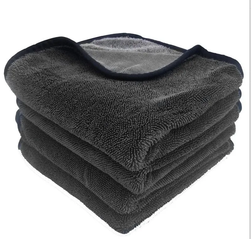 Grey car cleaning and pet bath towel with black hemmed edge, shown with a selection of different size options.