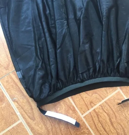 Black polyester mesh car sunshade side curtain placed on rear window, size L 75x45cm