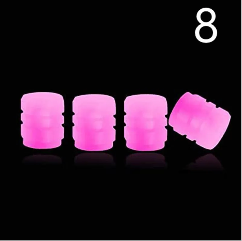 Pack of luminous rubber tyre valve caps in assorted colours including light blue and green.