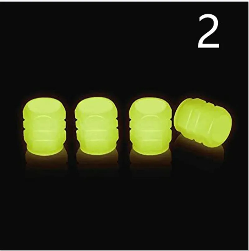 Pack of luminous rubber tyre valve caps in assorted colours including light blue and green.
