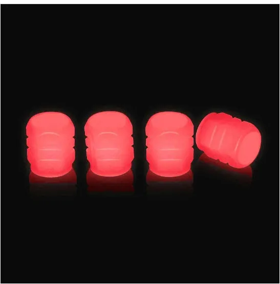Pack of luminous rubber tyre valve caps in assorted colours including light blue and green.