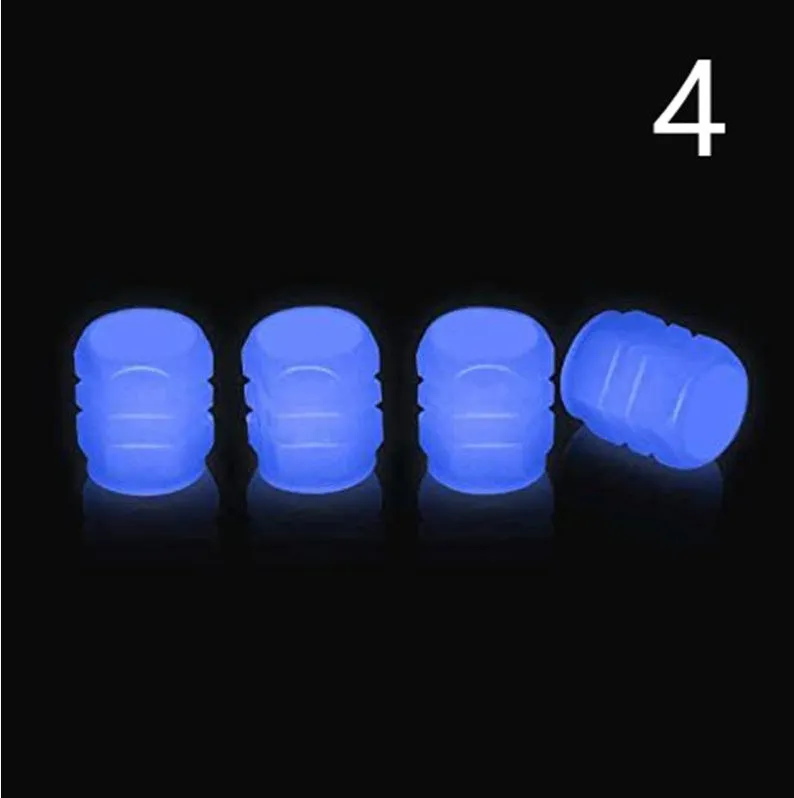 Pack of luminous rubber tyre valve caps in assorted colours including light blue and green.