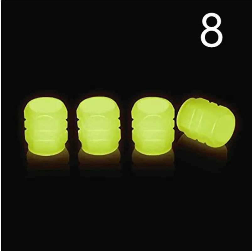 Pack of luminous rubber tyre valve caps in assorted colours including light blue and green.