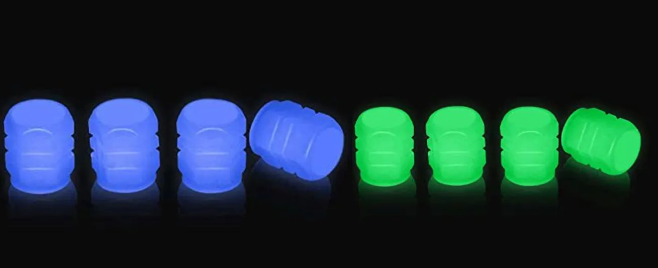 Pack of luminous rubber tyre valve caps in assorted colours including light blue and green.