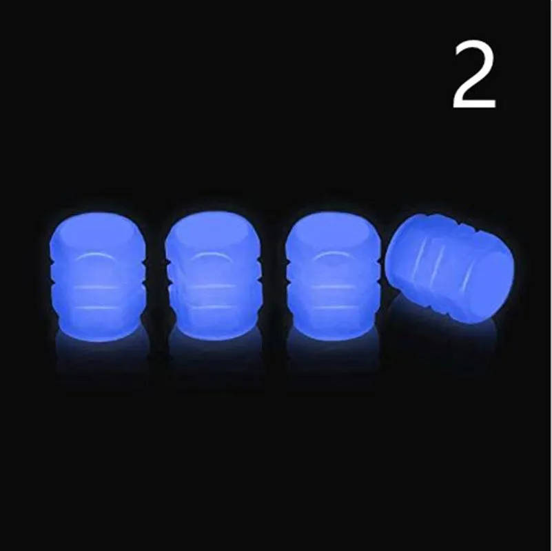 Pack of luminous rubber tyre valve caps in assorted colours including light blue and green.