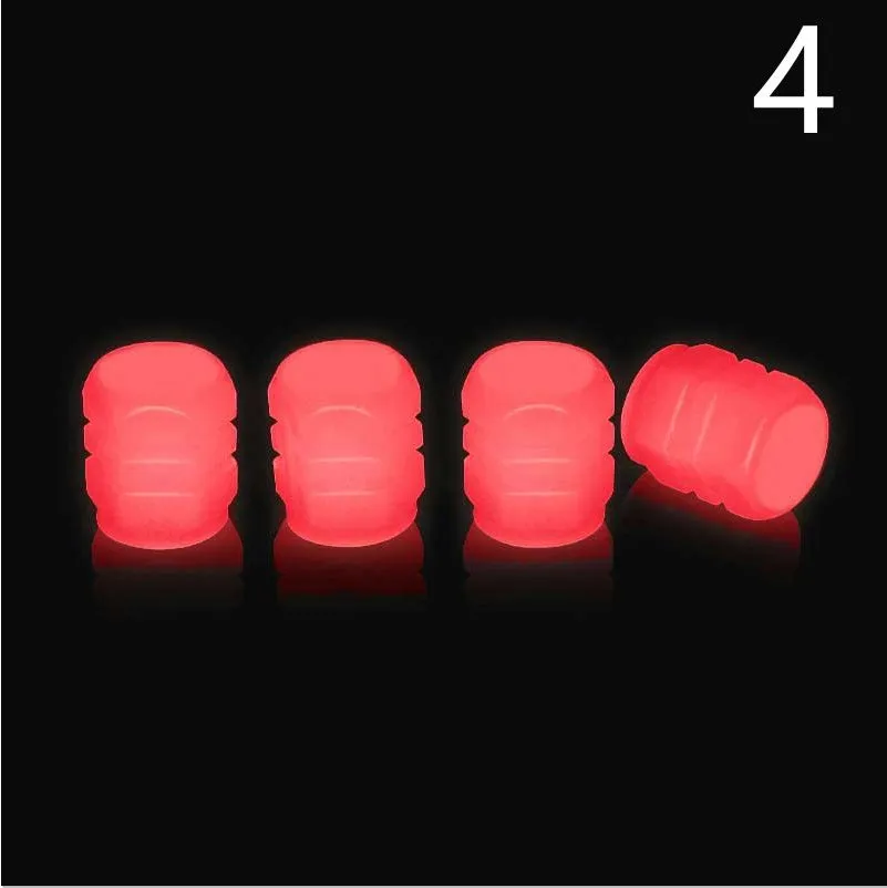 Pack of luminous rubber tyre valve caps in assorted colours including light blue and green.