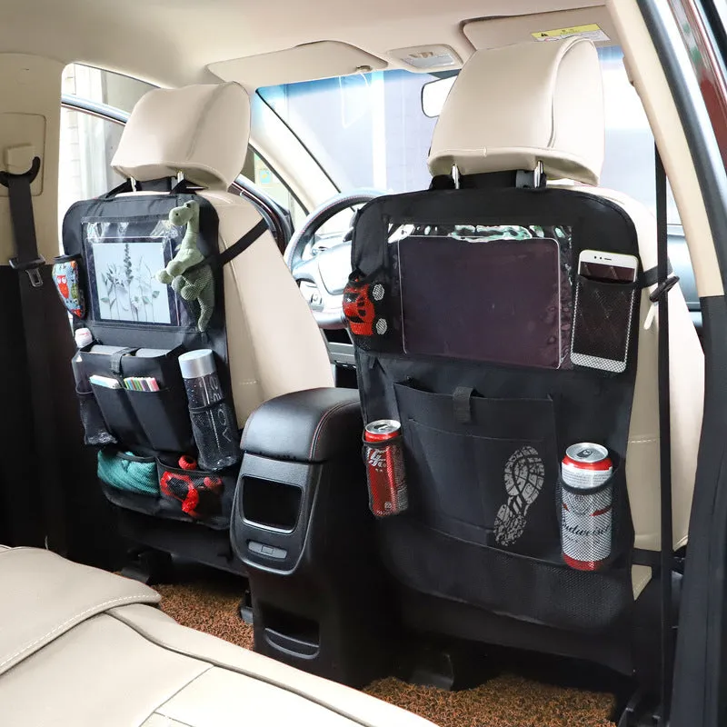 Black multi-pocket car organiser hanging on back seat headrest with phone and drink holders