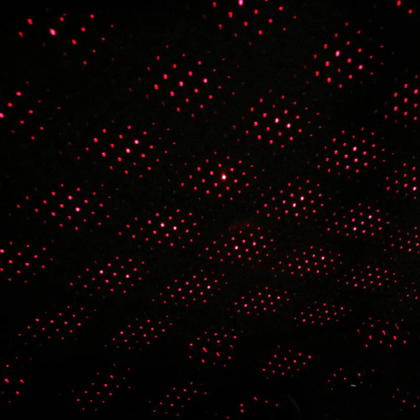 LED car roof star night lights projector showing purple Milky Way effect on car ceiling interior