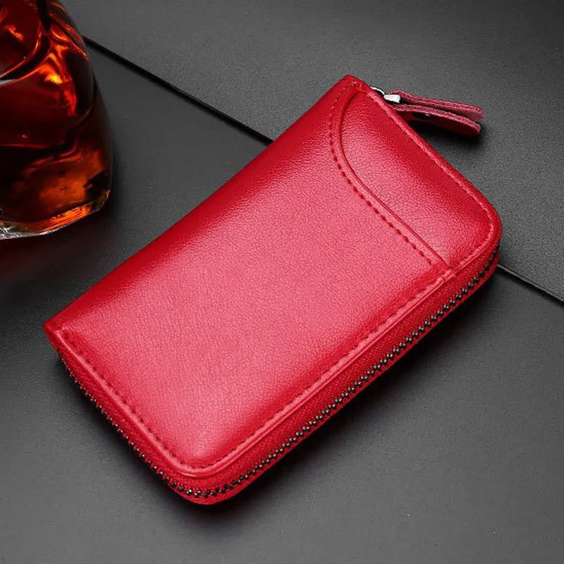 Genuine cowhide leather key case in solid colour with zipper closure and key holder position