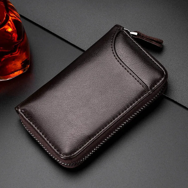 Genuine cowhide leather key case in solid colour with zipper closure and key holder position