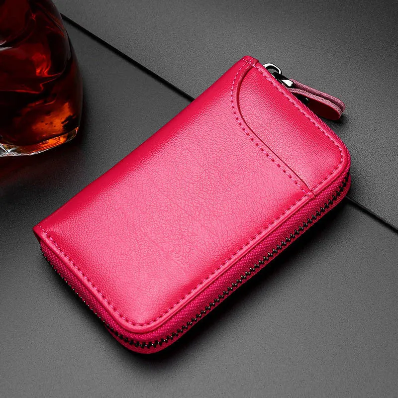 Genuine cowhide leather key case in solid colour with zipper closure and key holder position