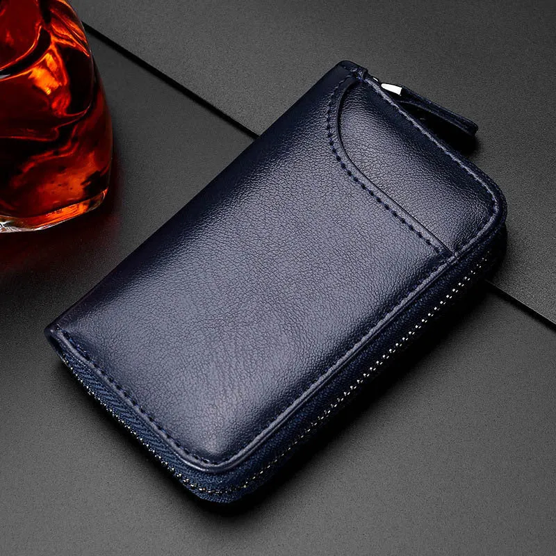 Genuine cowhide leather key case in solid colour with zipper closure and key holder position