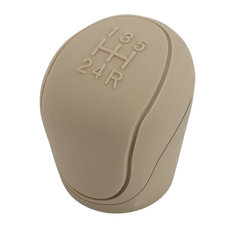 Universal silicone car gear cover in black with non-slip textured surface for driving
