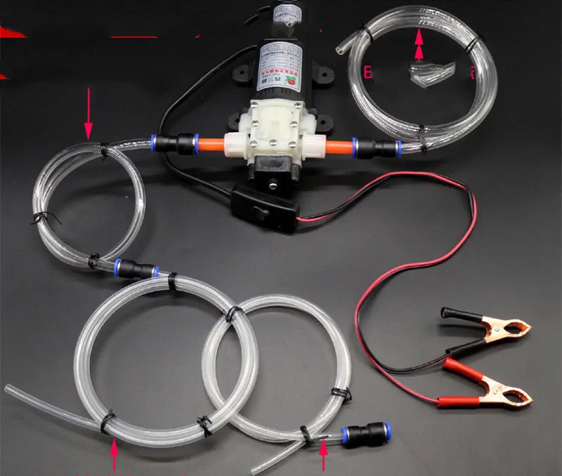 Self-priming electric oil changer with cigarette lighter plug and fish clip steel pipe