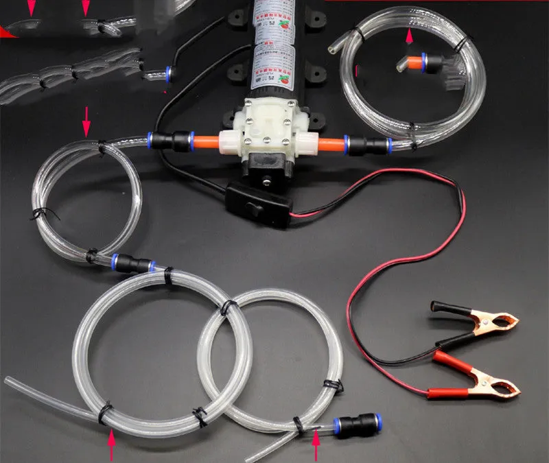 Self-priming electric oil changer with cigarette lighter plug and fish clip steel pipe