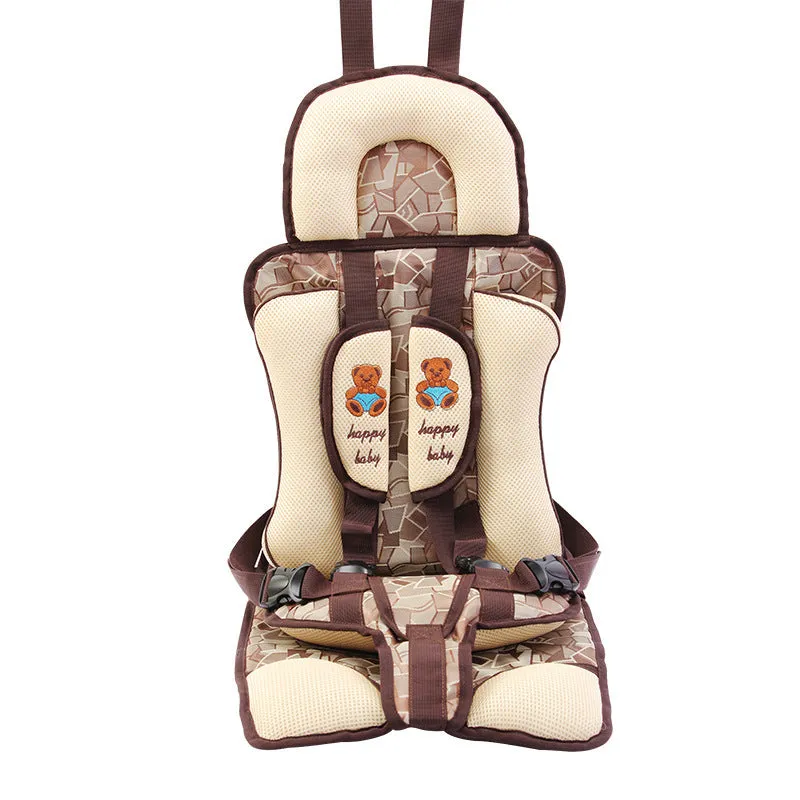 Portable toddler safety mat in brown plaid Oxford cloth with adjustable harness on a dining chair