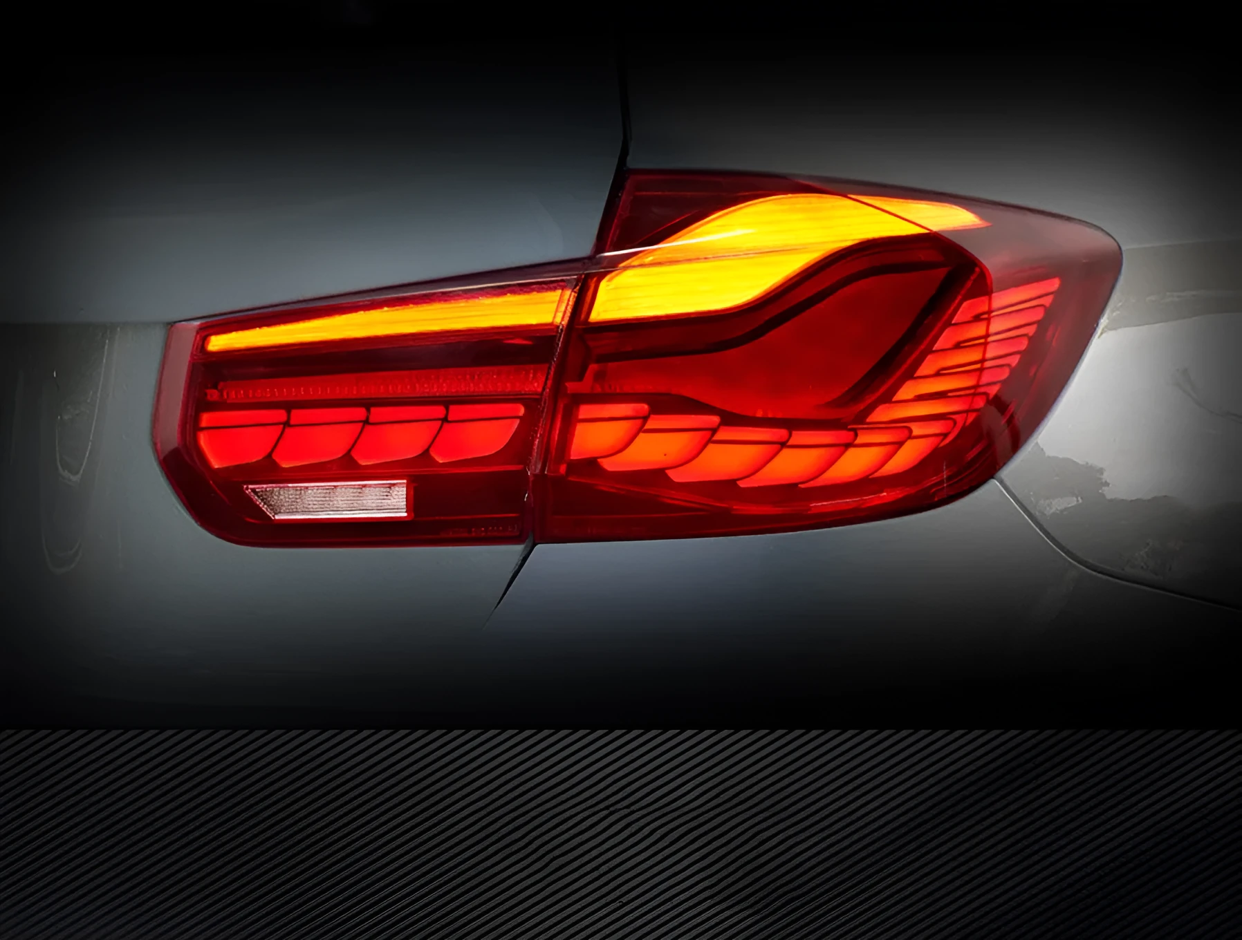 BMW 3 Series F30 F35 LED taillight assembly with red mirror cover, polycarbonate construction, size 540x400x240mm
