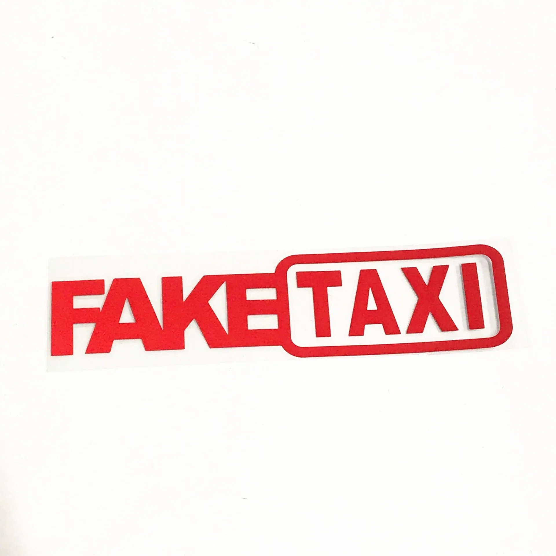 Fake Taxi drifting sign funny car sticker in black, 20x4.8cm on a car panel