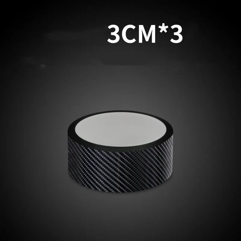 Set of car door anti-collision strips in carbon fiber black pattern on a gray surface, showing 30mm 50mm 70mm widths