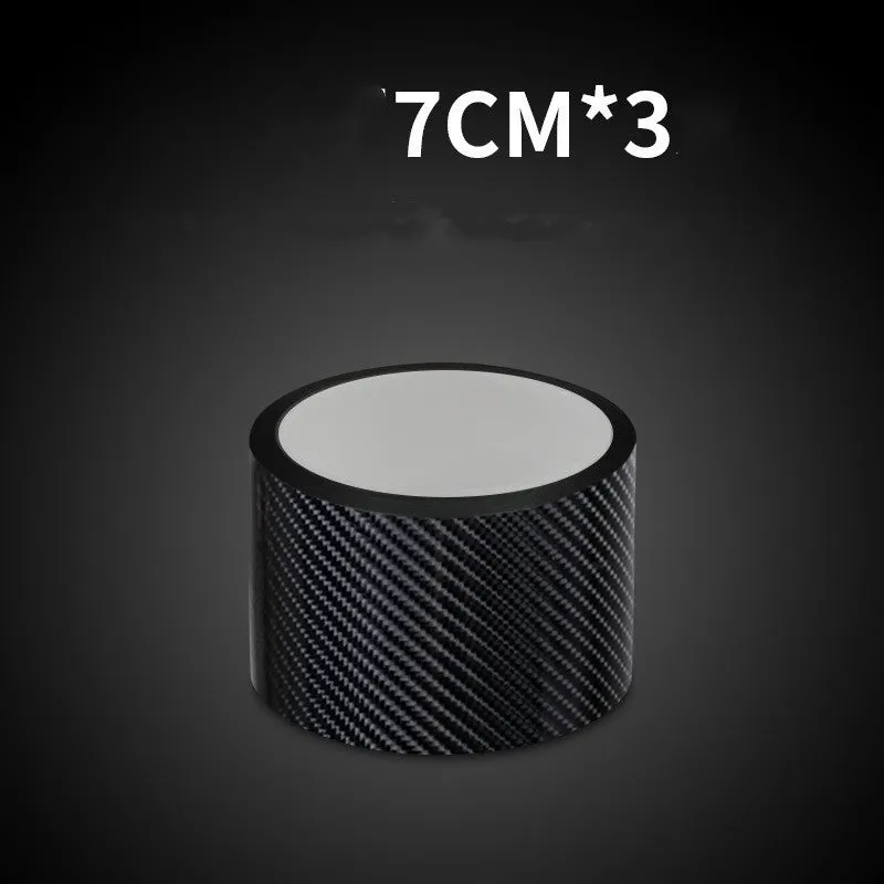 Set of car door anti-collision strips in carbon fiber black pattern on a gray surface, showing 30mm 50mm 70mm widths