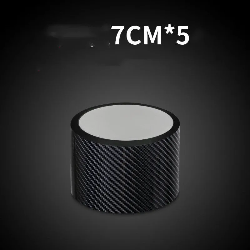 Set of car door anti-collision strips in carbon fiber black pattern on a gray surface, showing 30mm 50mm 70mm widths