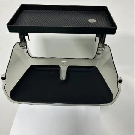 Black ABS plastic storage box fitted under the touchscreen of a Tesla Model Y interior.