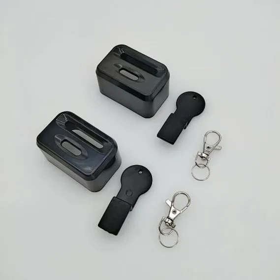 Seat belt buckle protective device in plastic ABS material shown in black and red colour options